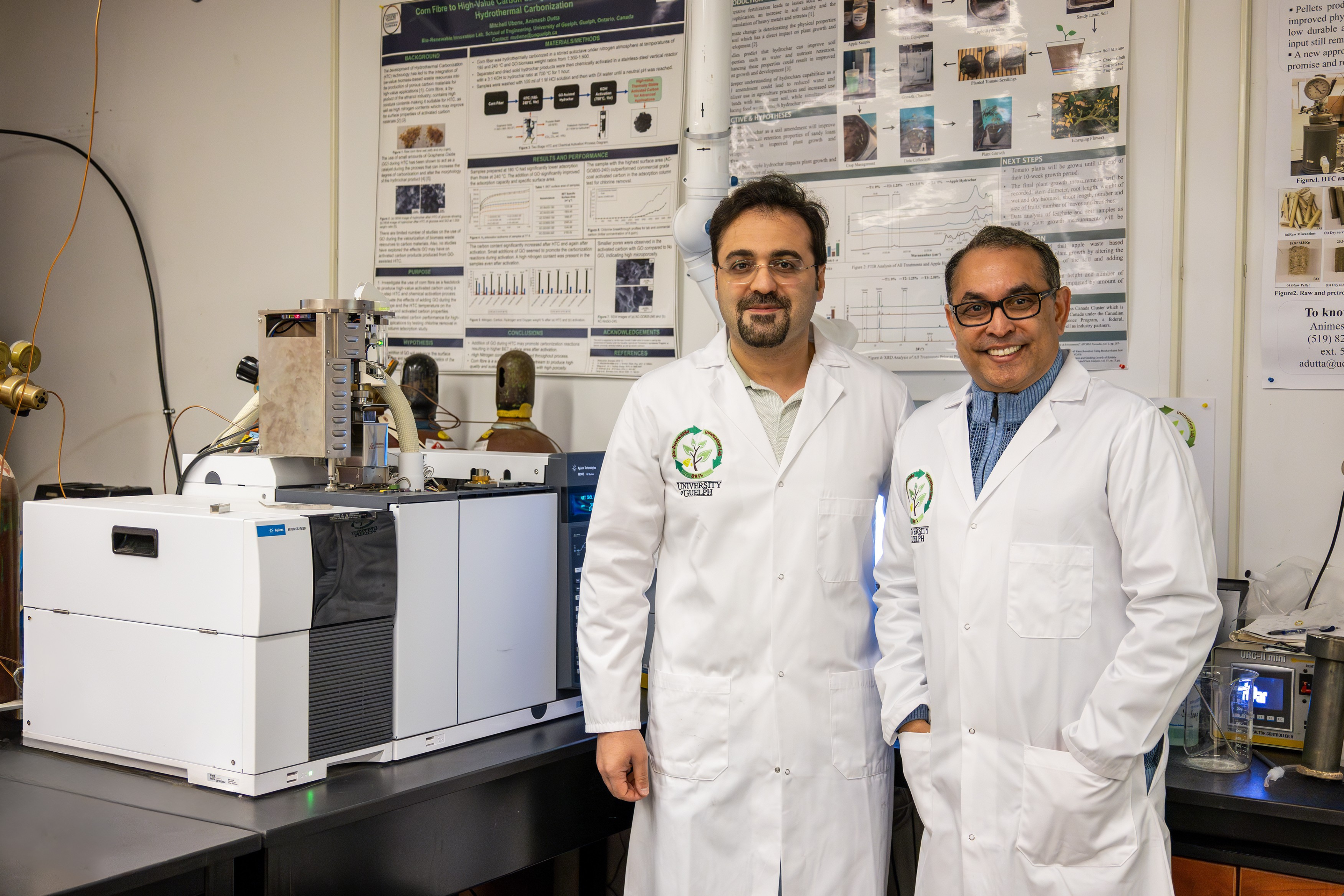 Drs. Omid Norouzi and Animesh Dutta standing in the BRIL lab.