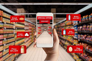 Image of hand holding mobile device with varying grocery items and prices showing