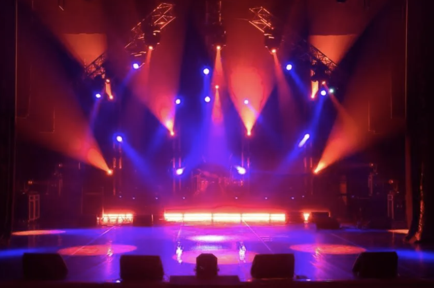 Image of concert with red and blue lights